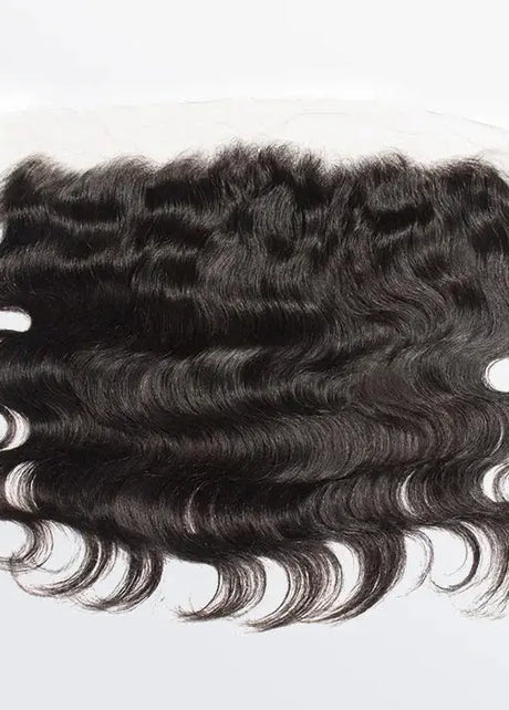 Body wave lace frontal from THE HAIR PUSHER PREMIUM LUXE HAIR, showcasing natural 13x6 hair extension with a smooth wave pattern.