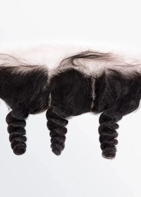 Loose wavy lace frontal in natural black #1B made from 100% human hair by The Hair Pusher, showing dark wavy hair with lace edge.