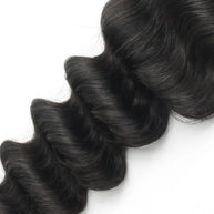 Deep Wave 2x6 HD lace human hair closure from THE HAIR PUSHER PREMIUM LUXE HAIR, showcasing textured hair extensions.
