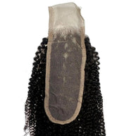 Afro kinky 2x6 transparent lace human hair closure from THE HAIR PUSHER PREMIUM LUXE HAIR, showing detailed lace and kinky curl texture.