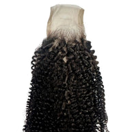 Afro kinky 2x6 transparent lace human hair closure from THE HAIR PUSHER PREMIUM LUXE HAIR, showing detailed lace and textured hair.