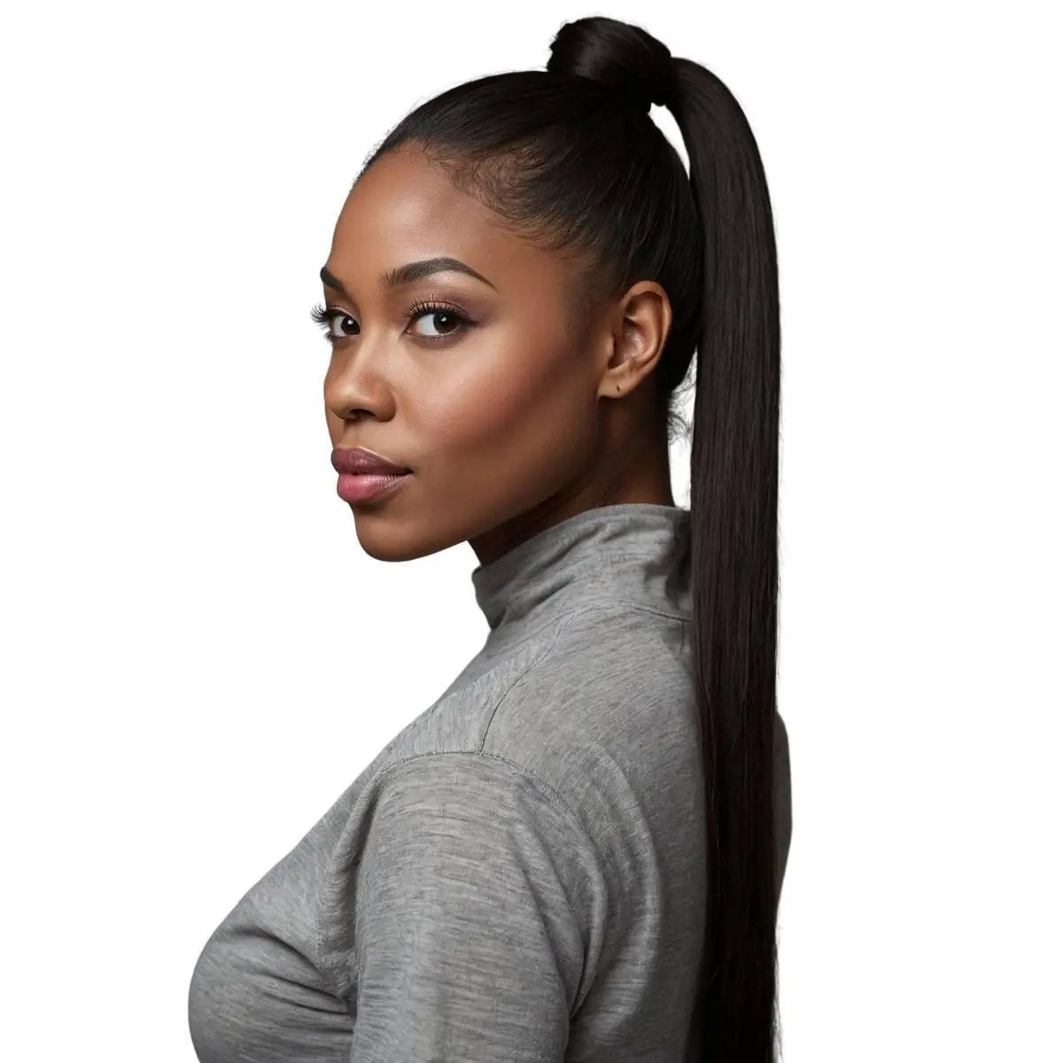 Natural black 100% human hair ponytail extension by THE HAIR PUSHER PREMIUM LUXE HAIR, showing sleek, smooth hair tied into a ponytail.
