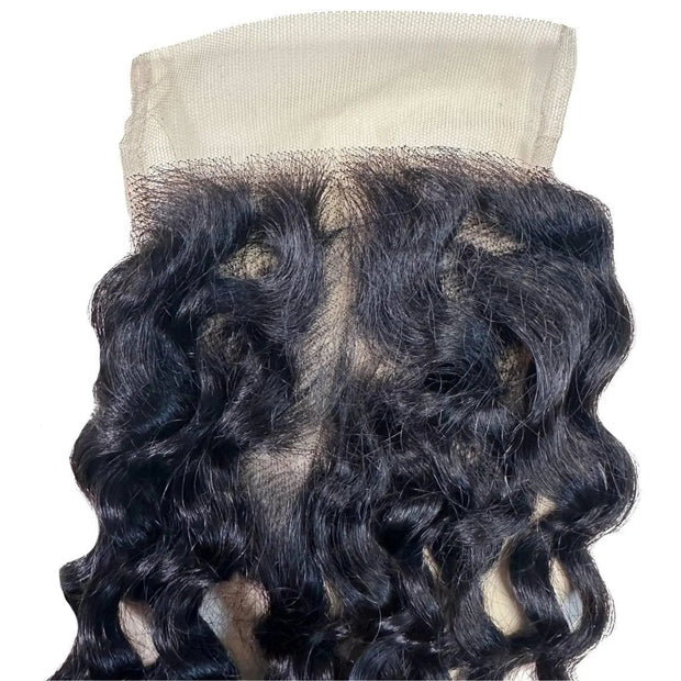 Spanish Wave 4x4 transparent lace human hair closure by THE HAIR PUSHER PREMIUM LUXE HAIR, featuring natural wave pattern and lightweight lace.