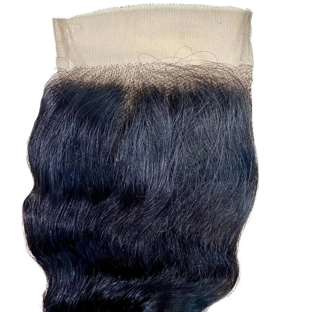 Loose wave 4x4 transparent lace human hair closure from THE HAIR PUSHER PREMIUM LUXE HAIR, showcasing natural wave pattern and lace detail.