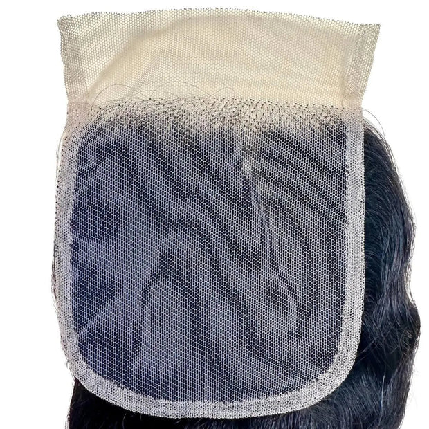 Loose wave 4x4 transparent lace human hair closure by THE HAIR PUSHER PREMIUM LUXE HAIR, showcasing natural waves and lace detail