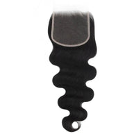 Body wave 5x5 HD lace human hair closure from THE HAIR PUSHER PREMIUM LUXE HAIR, showing detailed lace and natural wave pattern.