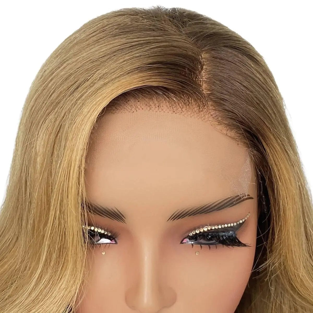 Honey blonde ombre wavy 5x5 HD lace closure wig from THE HAIR PUSHER PREMIUM LUXE HAIR, 26 inches, 180% density, detailed close-up.