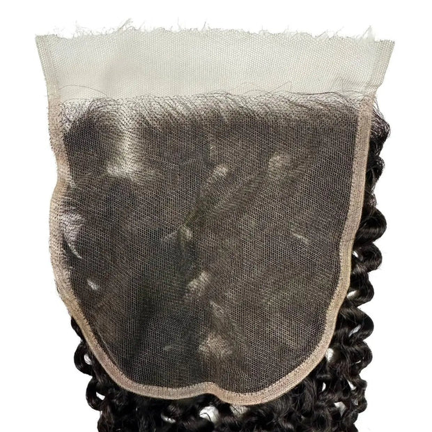 Kinky curly 6x6 HD lace human hair closure by THE HAIR PUSHER PREMIUM LUXE HAIR, showing detailed lace and curly hair texture.