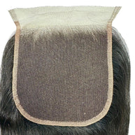 Jet black body wave HD lace human hair closure by THE HAIR PUSHER PREMIUM LUXE HAIR, showing detailed lace and wavy hair texture.