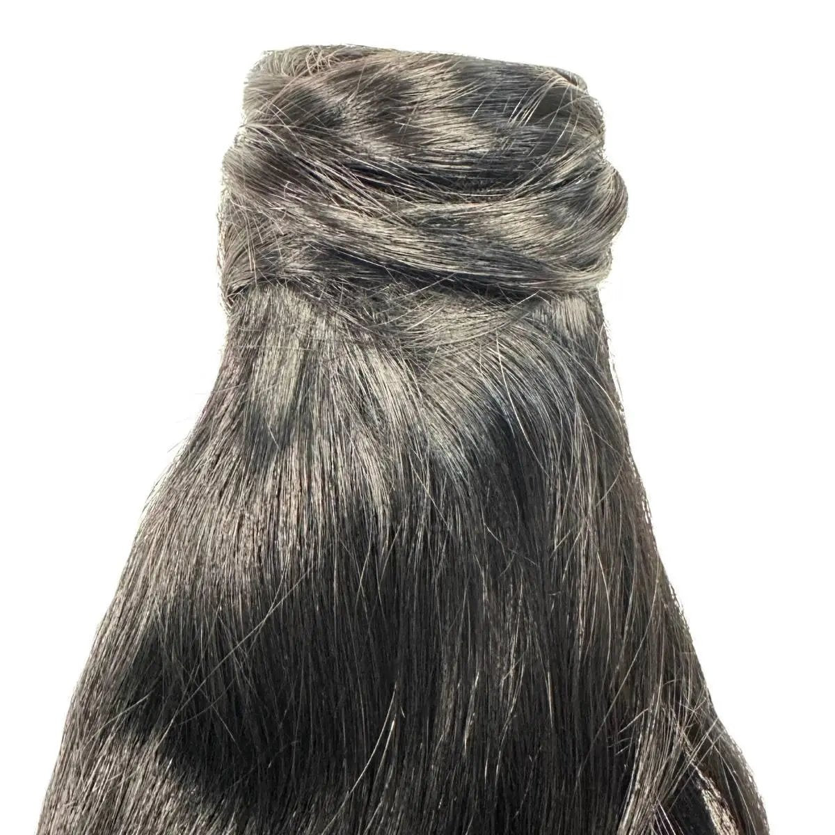 Jet black 100% human hair ponytail extension from THE HAIR PUSHER PREMIUM LUXE HAIR, showing the sleek, shiny ponytail attachment.