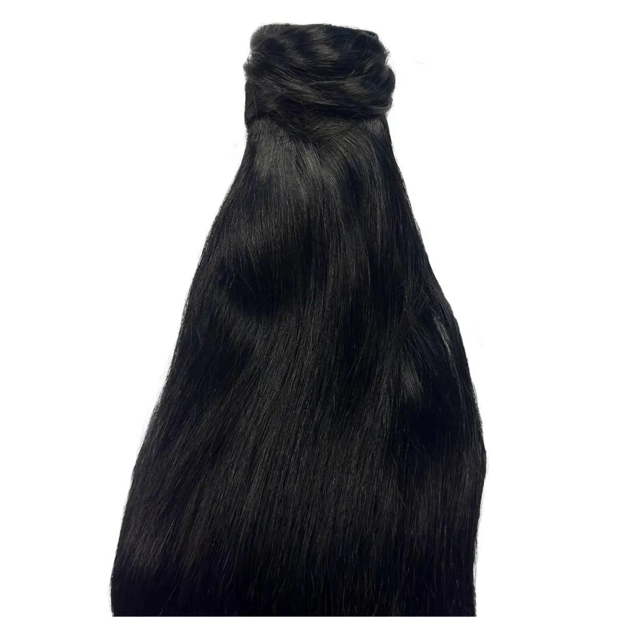 Jet black 100% human hair ponytail extension from THE HAIR PUSHER PREMIUM LUXE HAIR, showing a sleek, natural ponytail style.