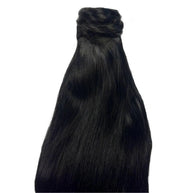 Jet black 100% human hair ponytail extension from THE HAIR PUSHER PREMIUM LUXE HAIR, showing a sleek, natural ponytail style.