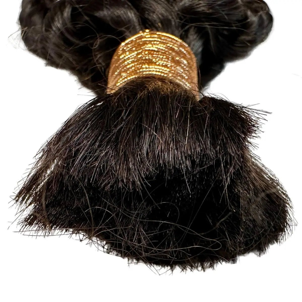 Close-up of Latin Wave bulk 100% human braiding hair extensions by THE HAIR PUSHER PREMIUM LUXE HAIR, showing silky, textured strands.