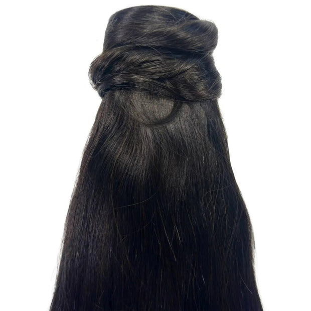 Natural black 100% human hair ponytail extension from THE HAIR PUSHER PREMIUM LUXE HAIR, showing a sleek, full-length ponytail.