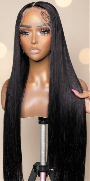 Straight raw Vietnamese HD lace frontal wig with sleek silky straight texture and 250% density by THE HAIR PUSHER.