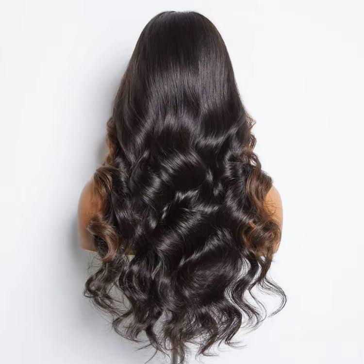 Velvet loose wave HD wig by THE HAIR PUSHER featuring soft, flowing wavy hair with a natural shine and full volume.