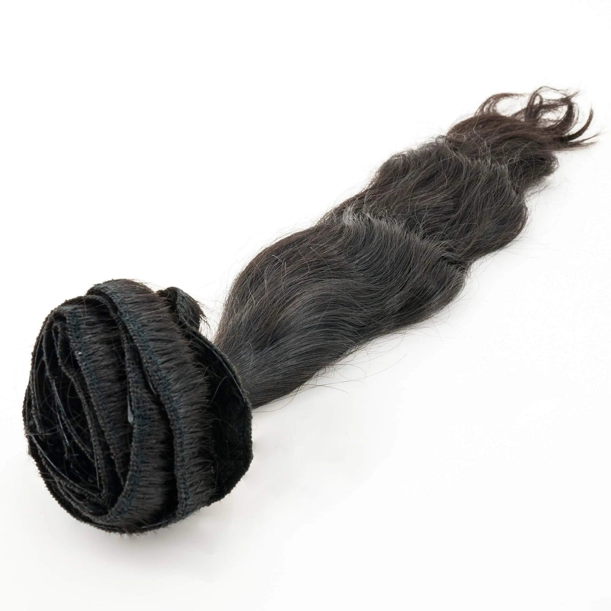 Indian wavy natural black clip-in hair extensions by THE HAIR PUSHER PREMIUM LUXE HAIR, showing the full length and wavy texture.