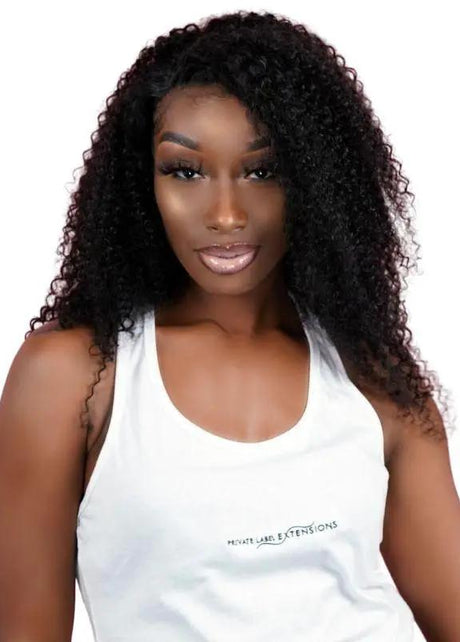Kinky Curly 100% human hair bundles from THE HAIR PUSHER PREMIUM LUXE HAIR, showing thick, curly extension bundles on a white background.