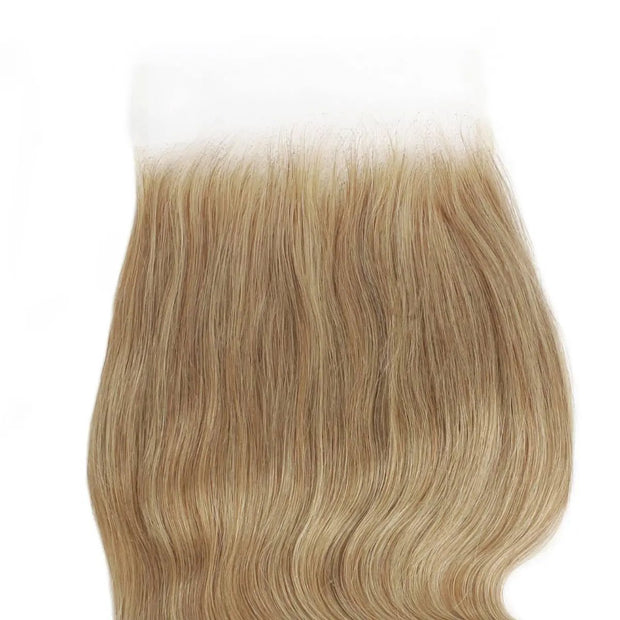 Honey blonde 5x5 HD lace human hair closure from THE HAIR PUSHER PREMIUM LUXE HAIR, showcasing a natural wave pattern and detailed lace construction.