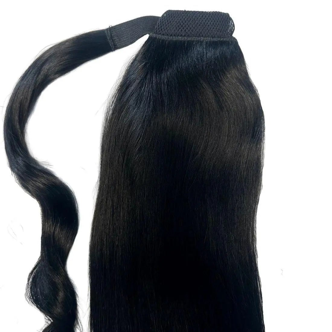 Jet black 100% human hair ponytail extension from THE HAIR PUSHER PREMIUM LUXE HAIR, showcasing smooth, shiny hair attachment.