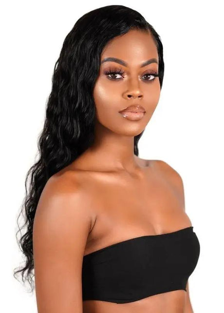Side view of THE HAIR PUSHER PREMIUM LUXE HAIR loose wave 13x4 transparent lace front human hair wig showcasing natural waves and lace details.