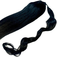 Jet black 100% human hair ponytail extension from THE HAIR PUSHER PREMIUM LUXE HAIR, showcasing a sleek, natural-looking hair extension.