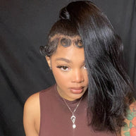 Real natural black 100% human hair ponytail extension from THE HAIR PUSHER PREMIUM LUXE HAIR, showing smooth, shiny hair ready to wear.