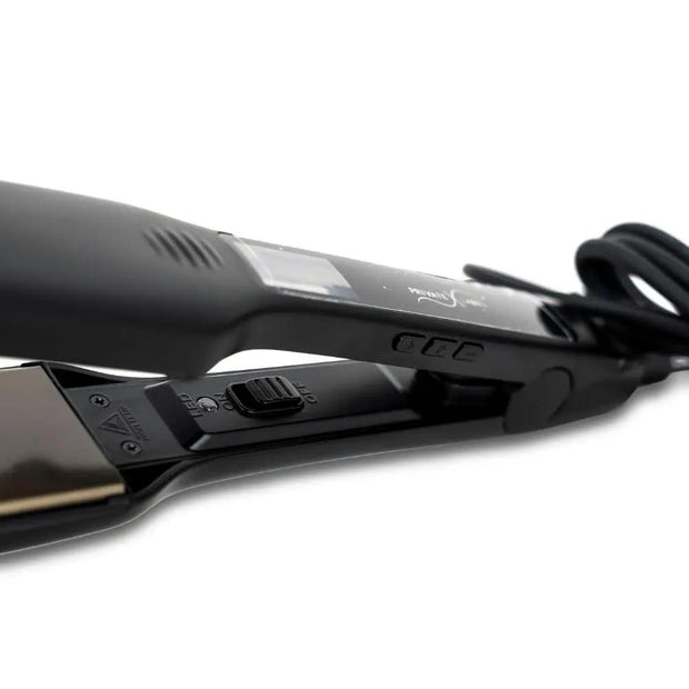 Close-up of THE HAIR PUSHER PREMIUM LUXE HAIR 1.75 inch titanium flat iron for hair styling, showing sleek, shiny titanium plates.